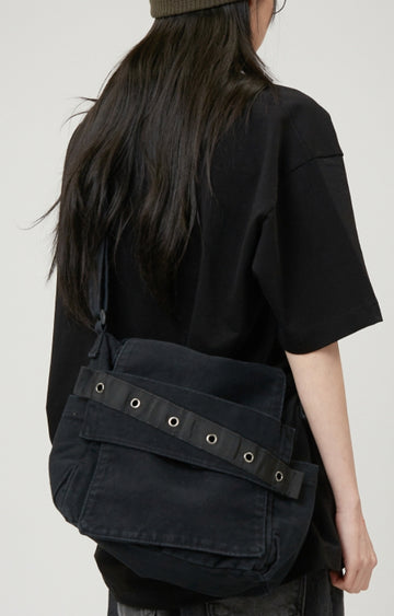 Eyelet denim cross bag